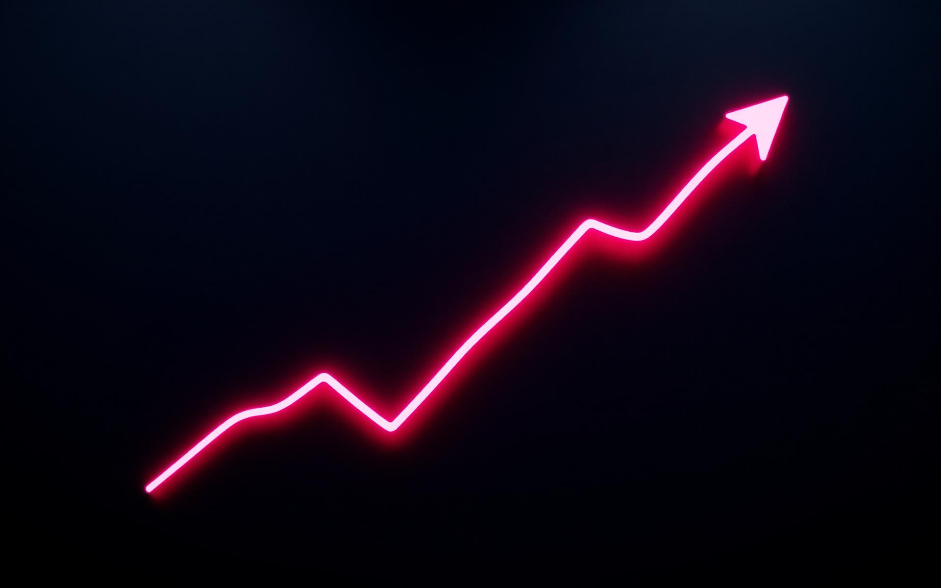 An upward growth chart glowing against a dark textured background